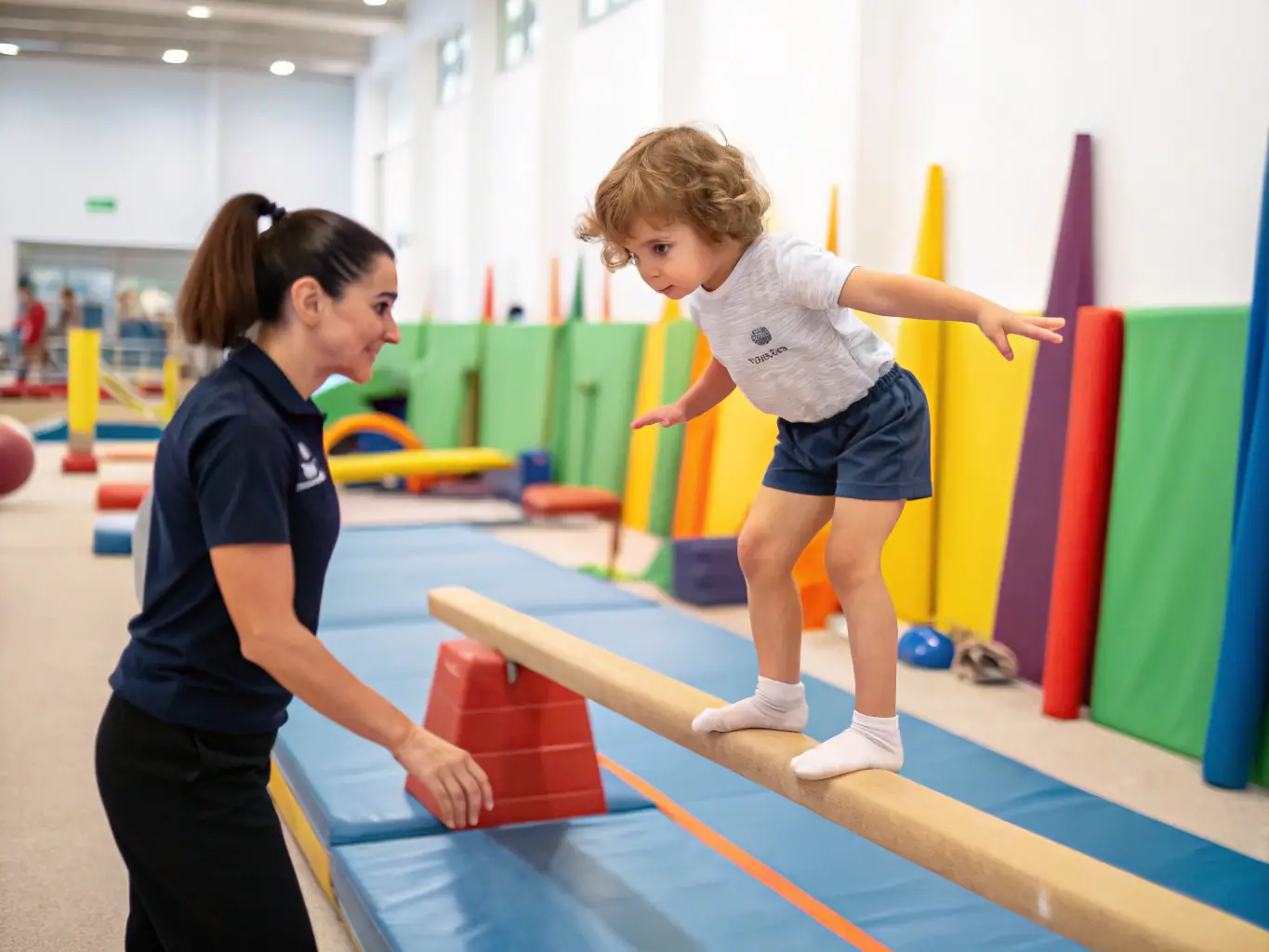 A group of children participating in a gymnastics class, focusing on balance and coordination, with a qualified instructor guiding them in a safe and supportive environment.